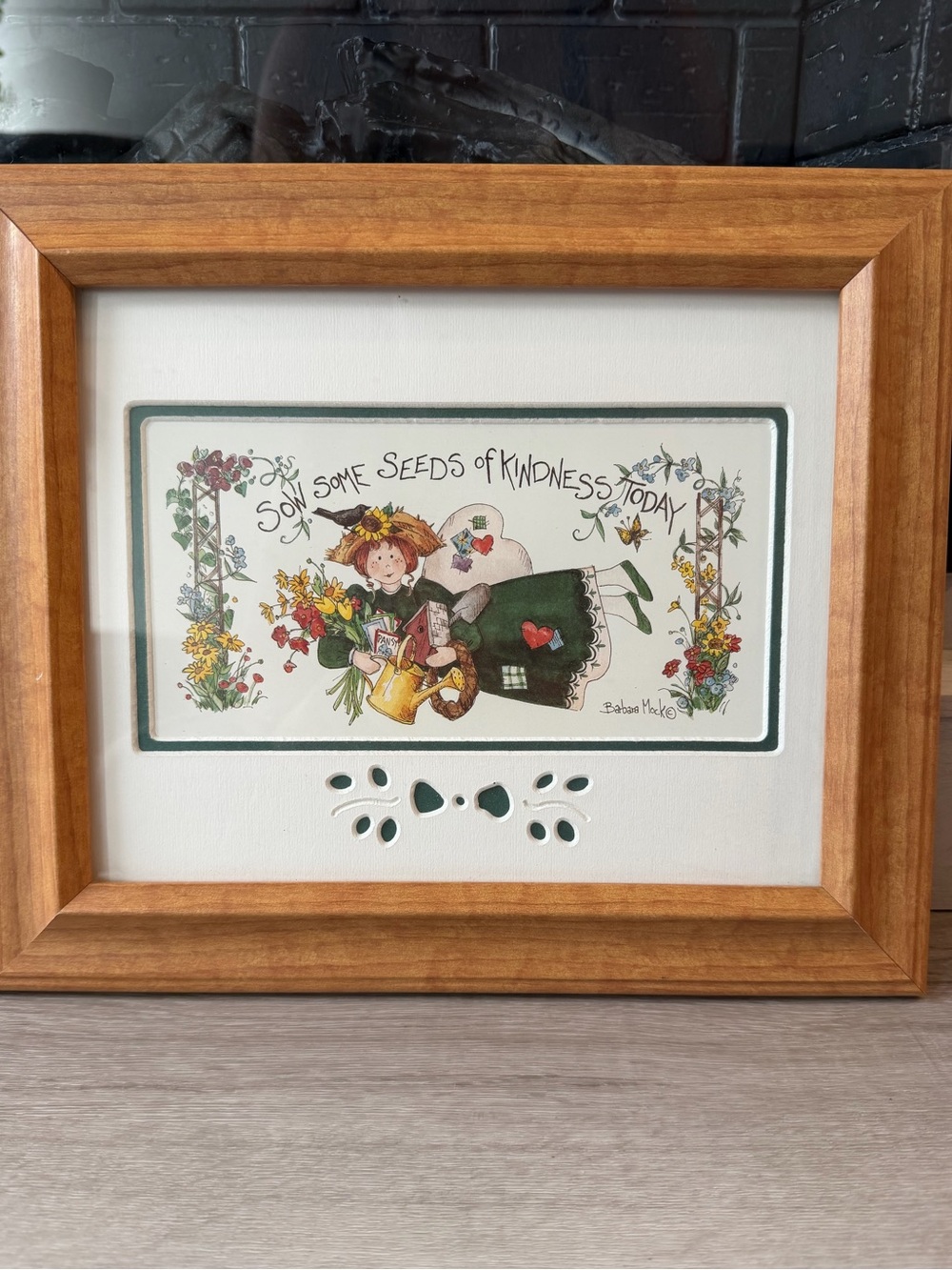 Barbara Mock “sow some seeds of kindness today” in a wooden frame